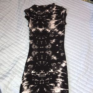 Long body hugging dress (almost to the ankle)